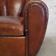 Club chair with floral backrest