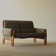 Olive leather two seater sofa, 1970'