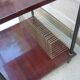 Wooden vintage table on wheels