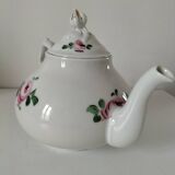 Porcelain teapot with rose patterns