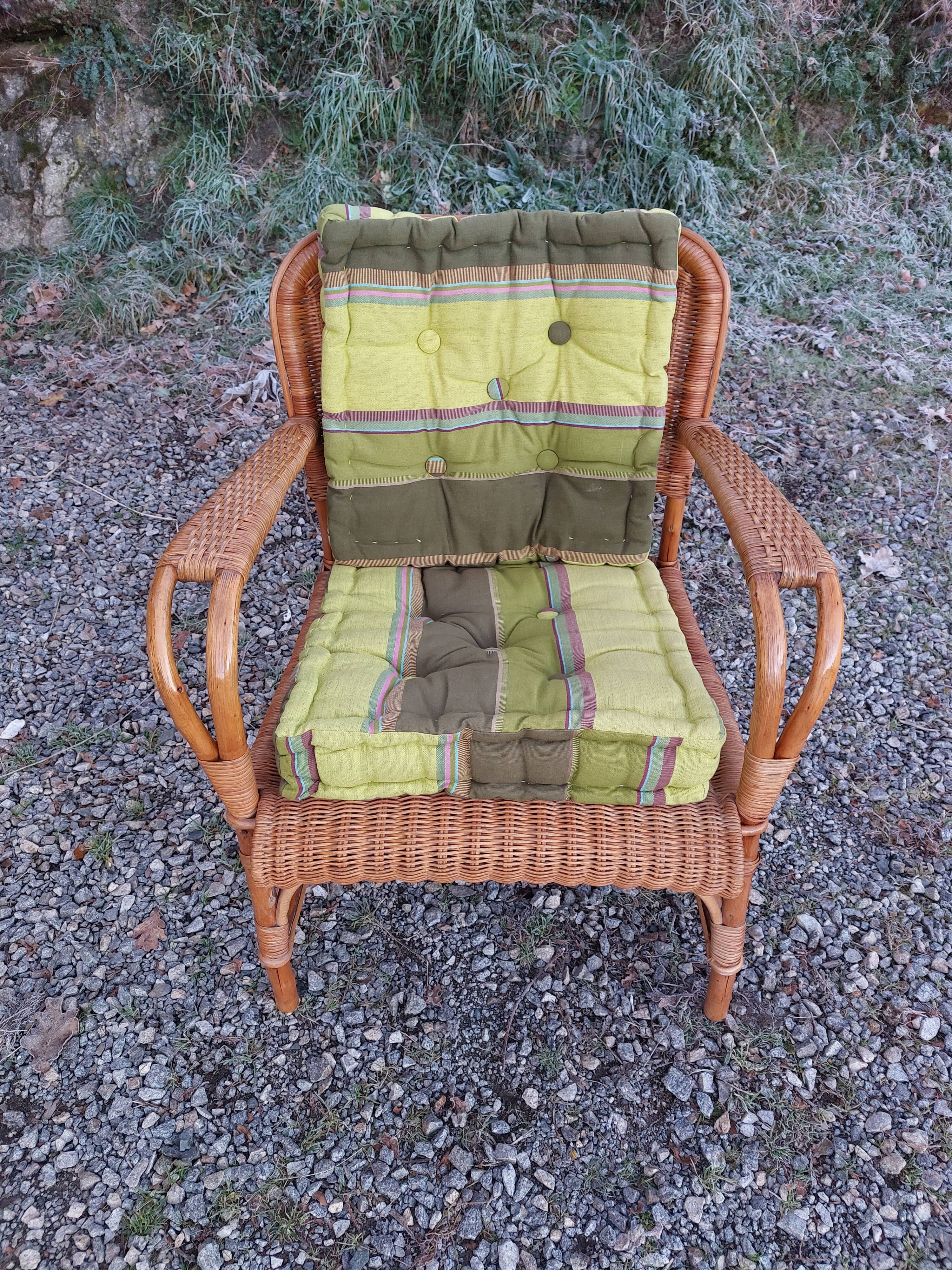 4 armchairs and a coffee table made of rattan and bamboo wood, vintage.