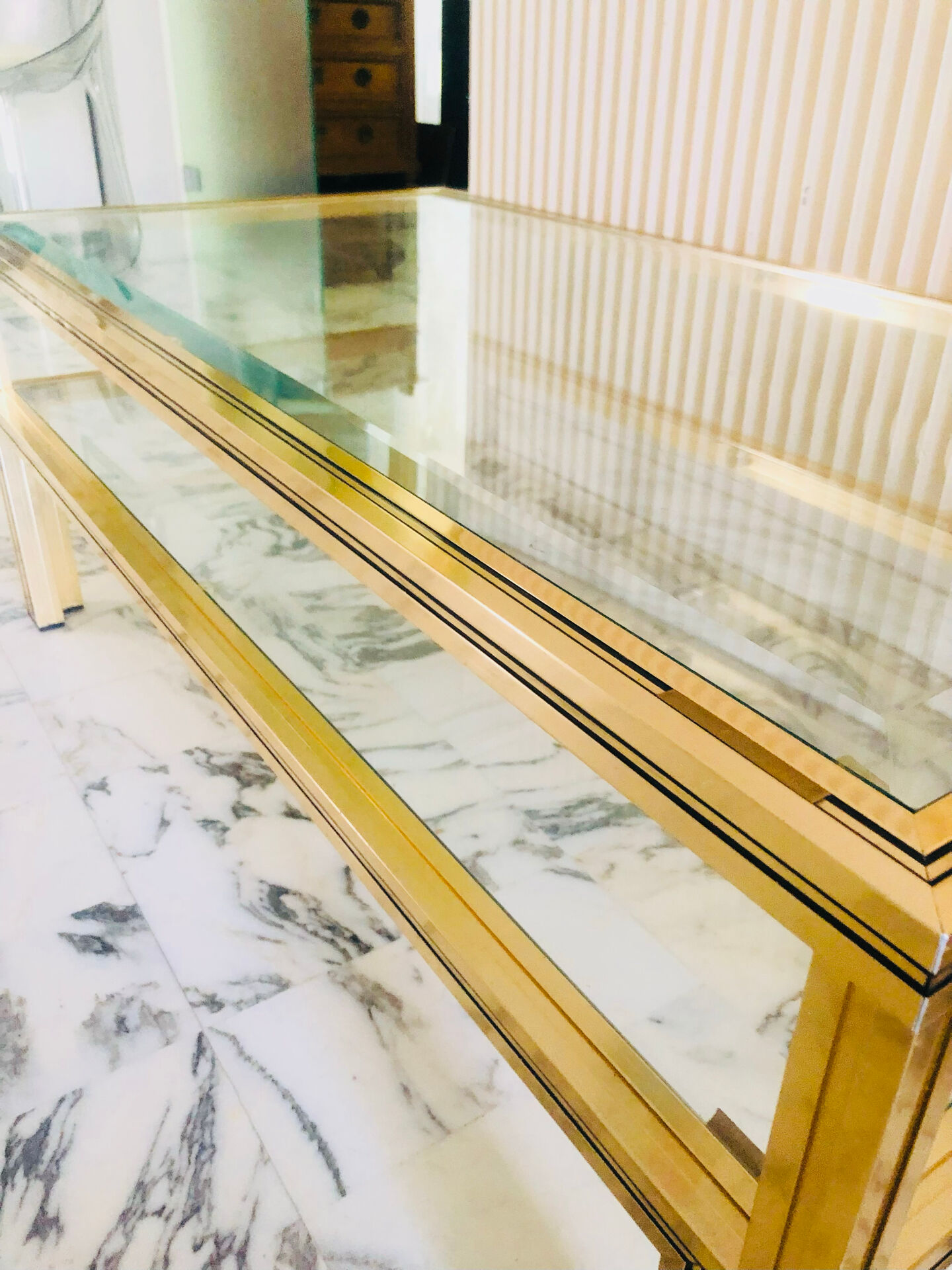 Coffee table with 2 brass and glass tops signed Pierre Vandel Paris, circa 70s.