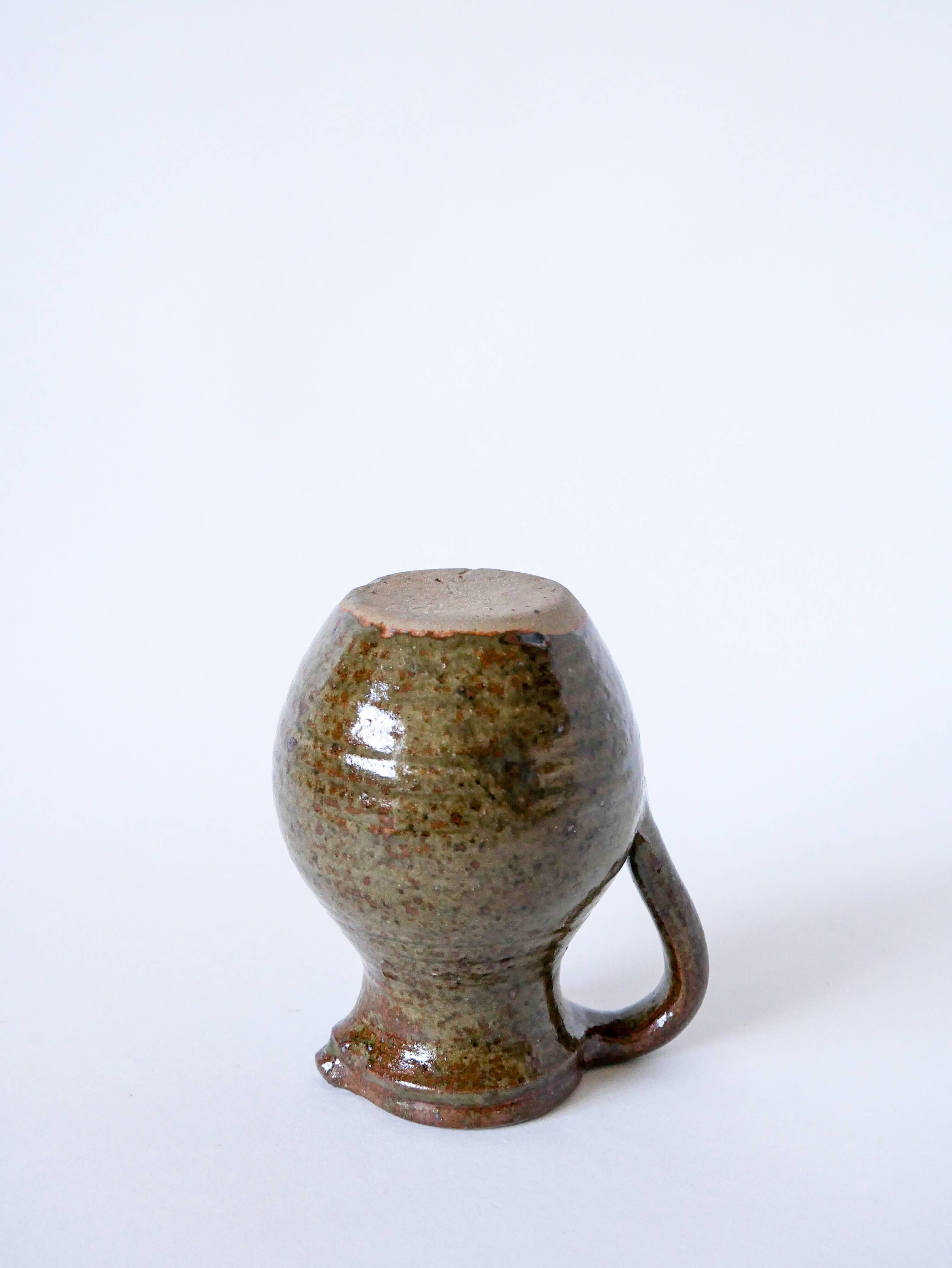 Small pitcher in dark brown glazed stoneware 1970