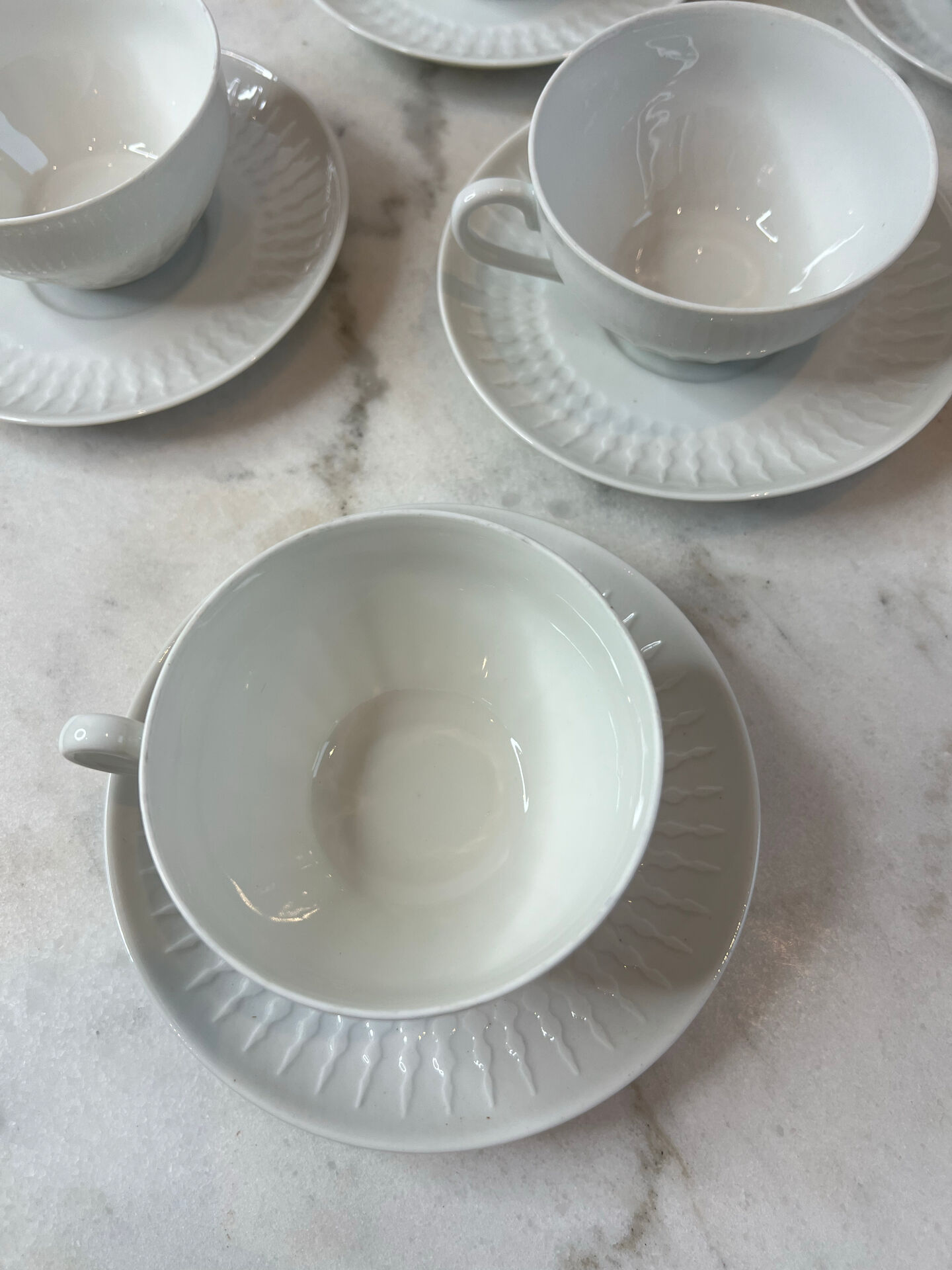 Set of 4 porcelain cups and saucers F. Chauvigny