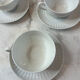 Set of 4 porcelain cups and saucers F. Chauvigny