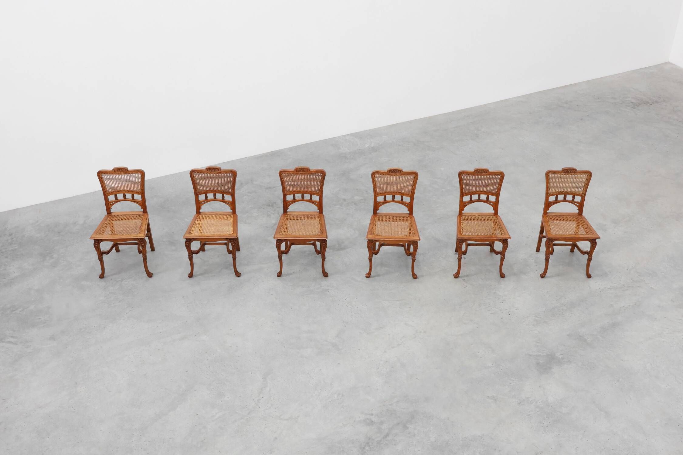 Set of 6 art nouveau dinner chairs in the manner of Victor Horta, Belgium