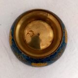 Brass cup with partitioned floral pattern chiseled contour