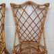 Pair of rattan chairs by Louis Sognot