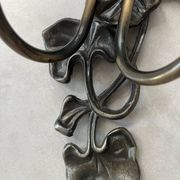 Apply 2 pink tulip Art Nouveau wall lights.