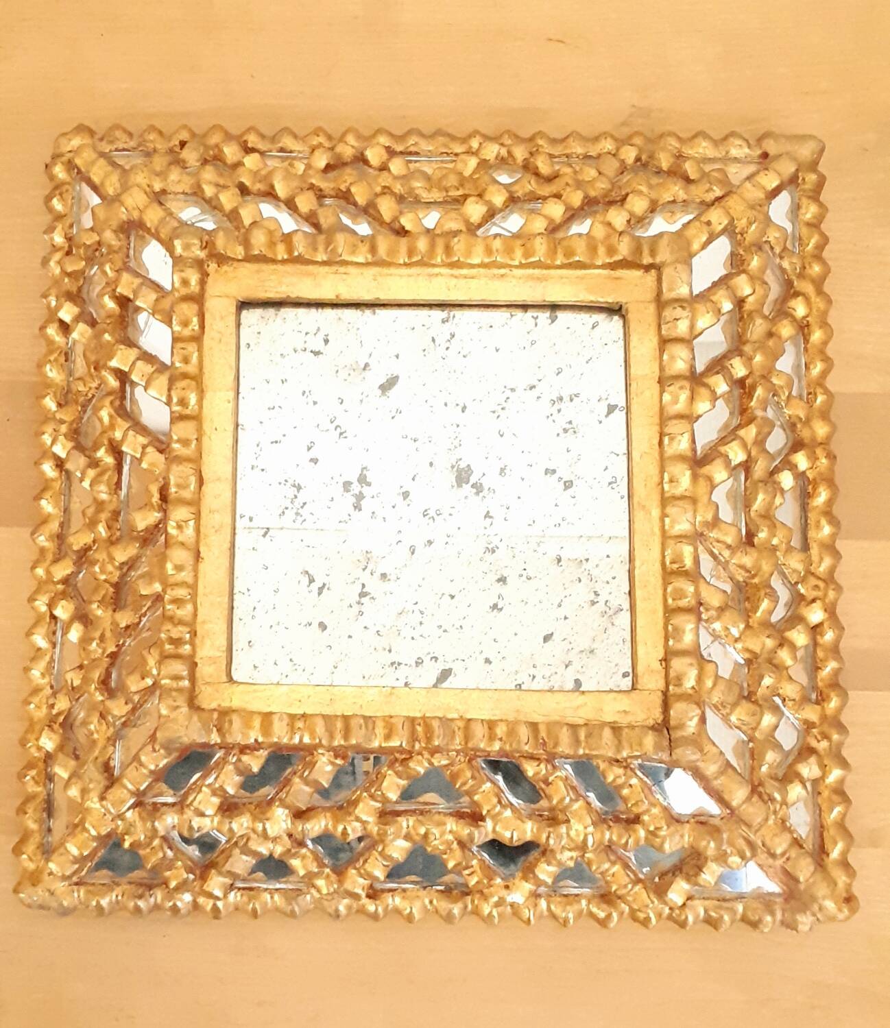 Vintage gilded mirror with glazing beads