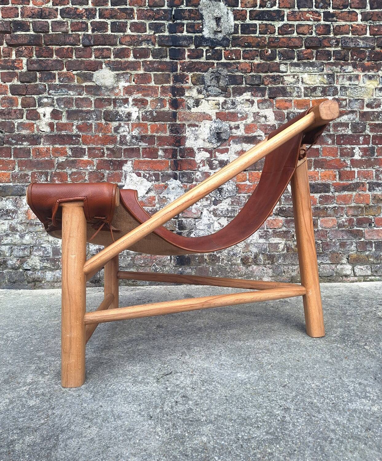 Vintage tripod armchair, designer seating furniture