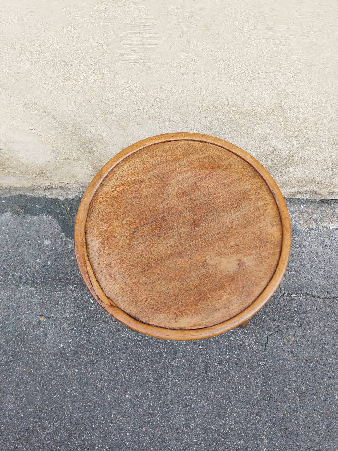 Curved wooden stool