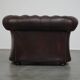 Beautiful and spacious dark brown mottled English cow leather Chesterfield armchair