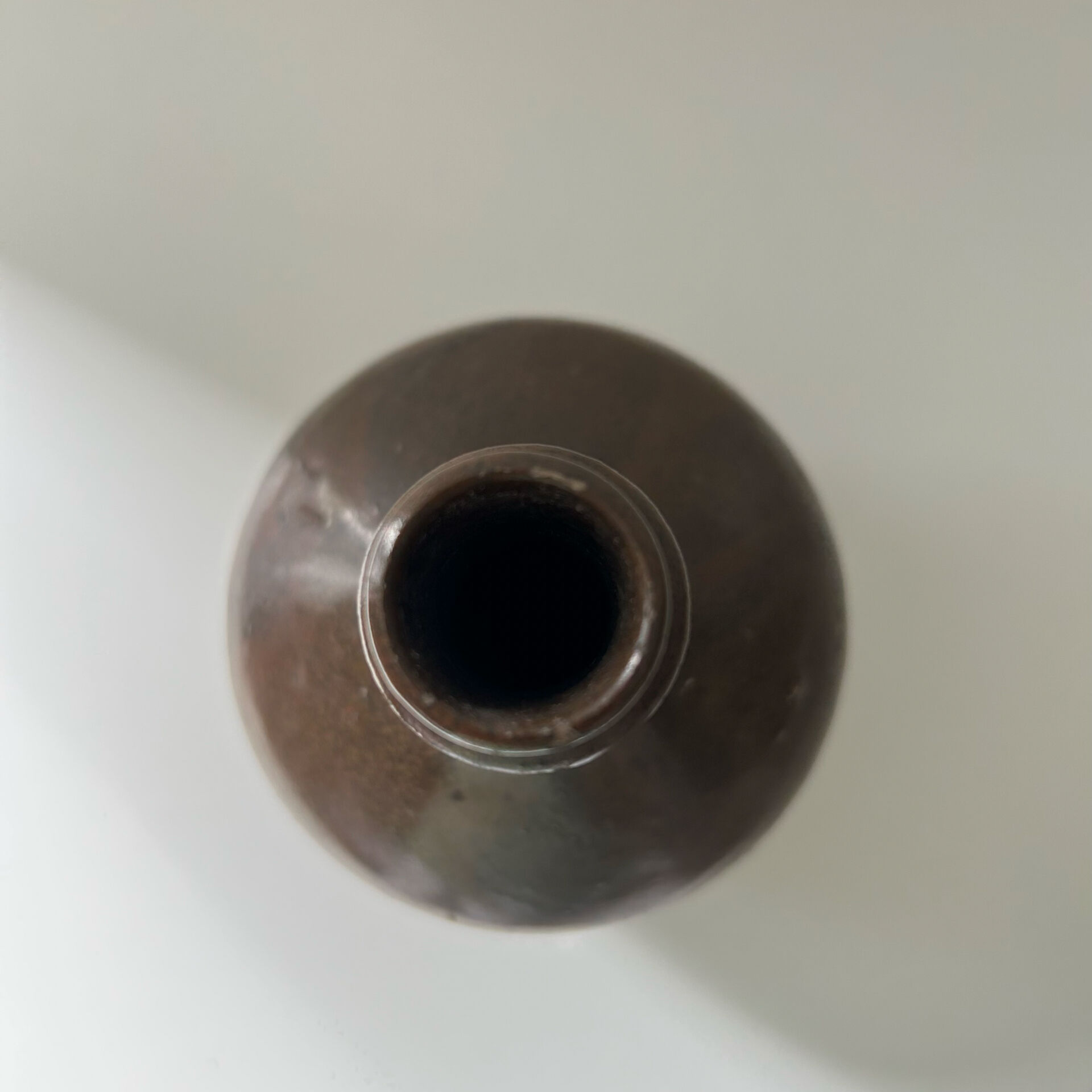 Brown two-tone stoneware bottle