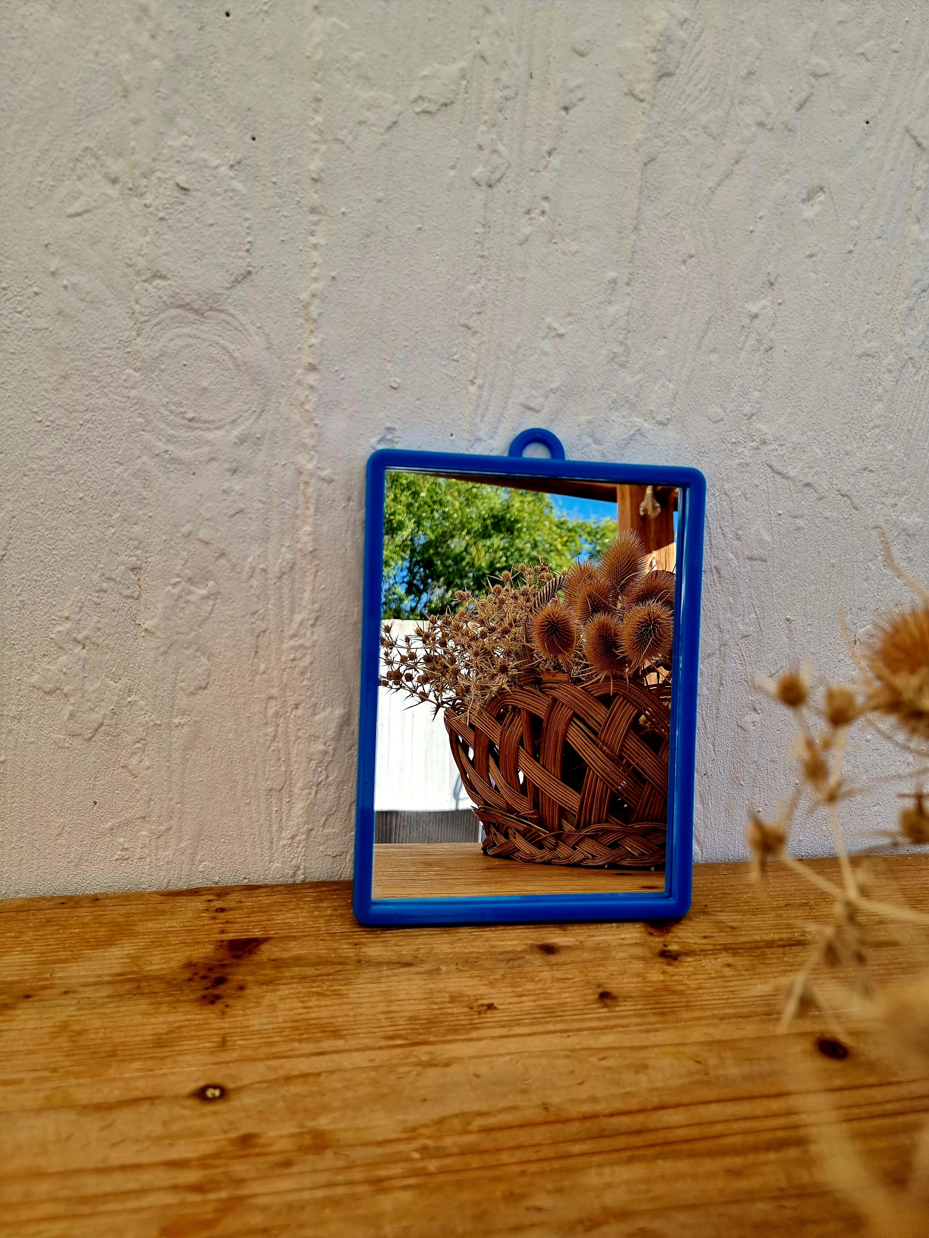 Vintage blue barber mirror