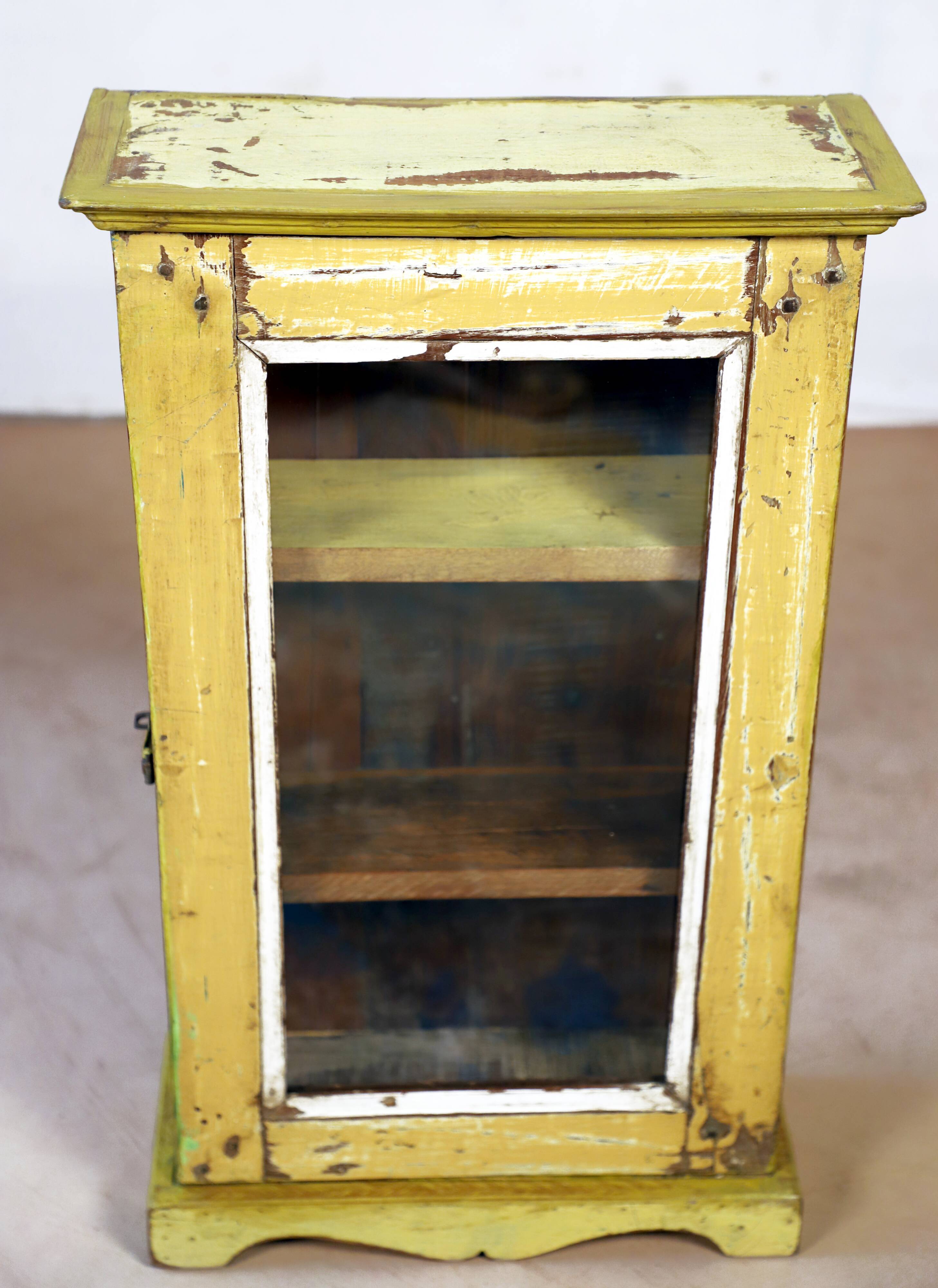 Burmese teak wall shelf with original yellow patina