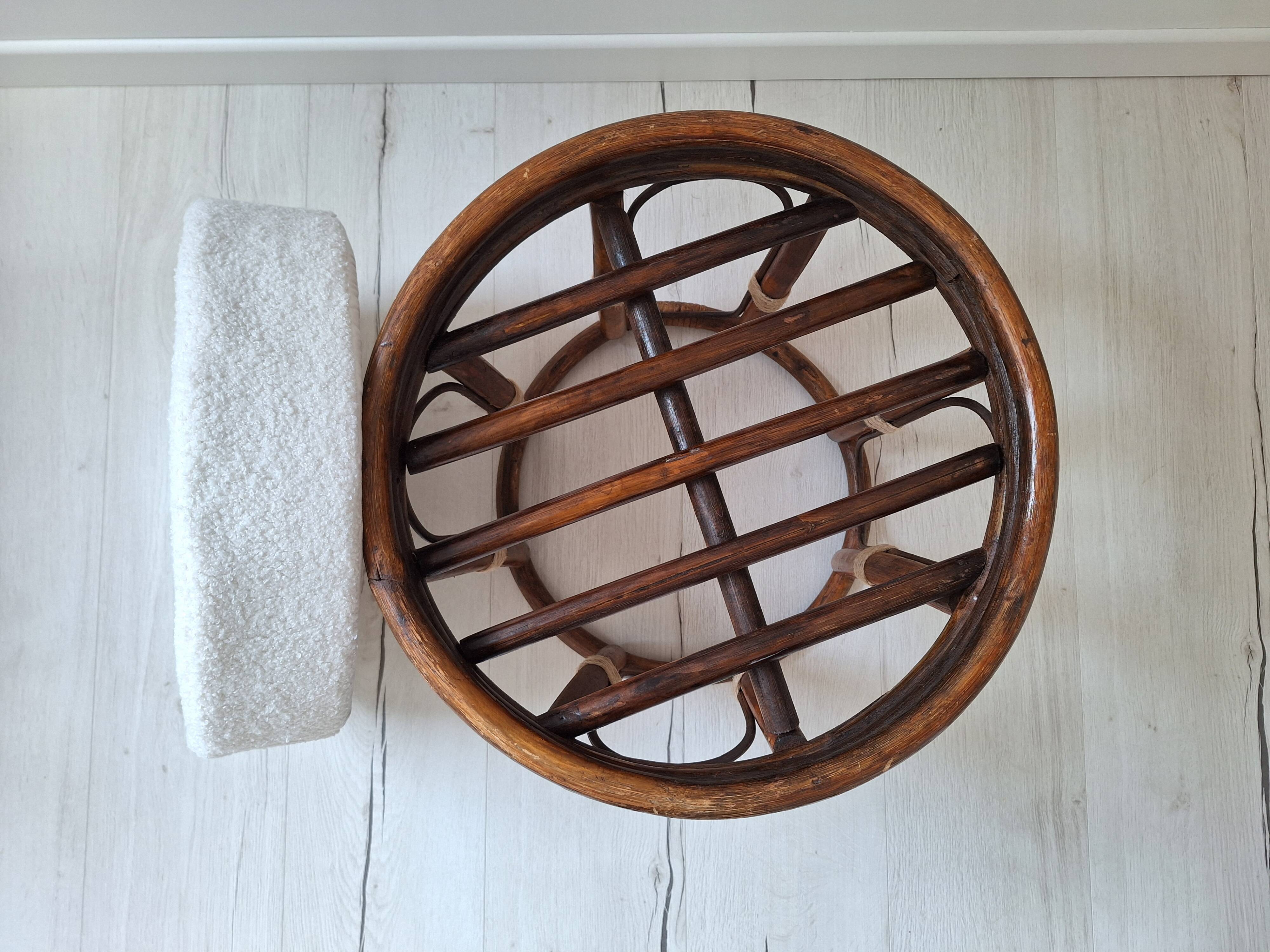 Rattan and boucle fabric pouf