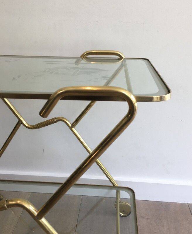 Italian designer rolling table in brass and engraved glass