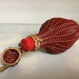 Petite bouteille décorative osier rouge bordeaux