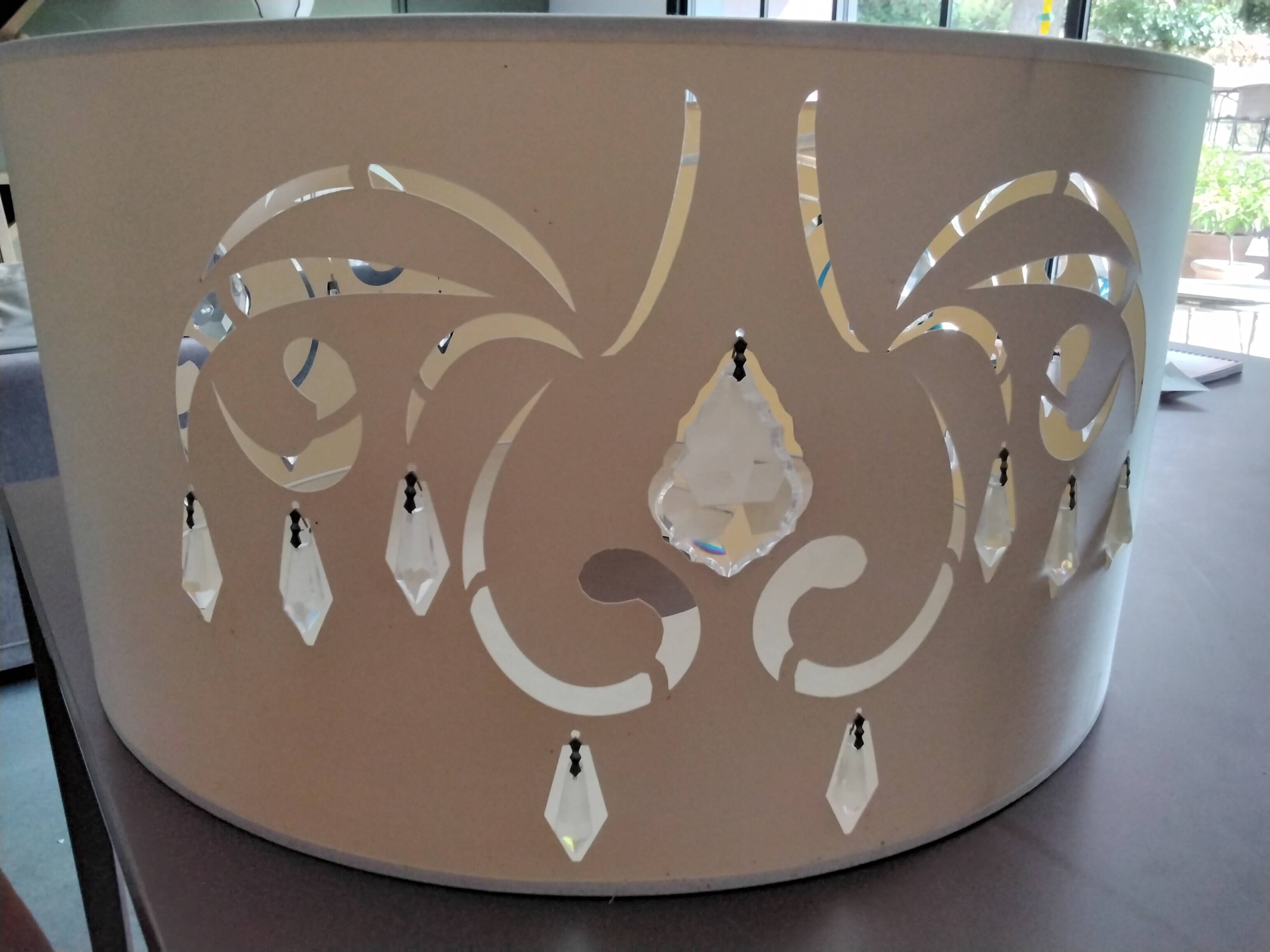 Beige fabric lampshade with crystal inlay.