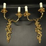 Pair of large Louis XV style wall lights - gilded bronze