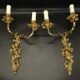 Pair of large Louis XV style wall lights - gilded bronze