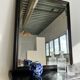 Rectangular mirror in molded blackened wood, beveled glass