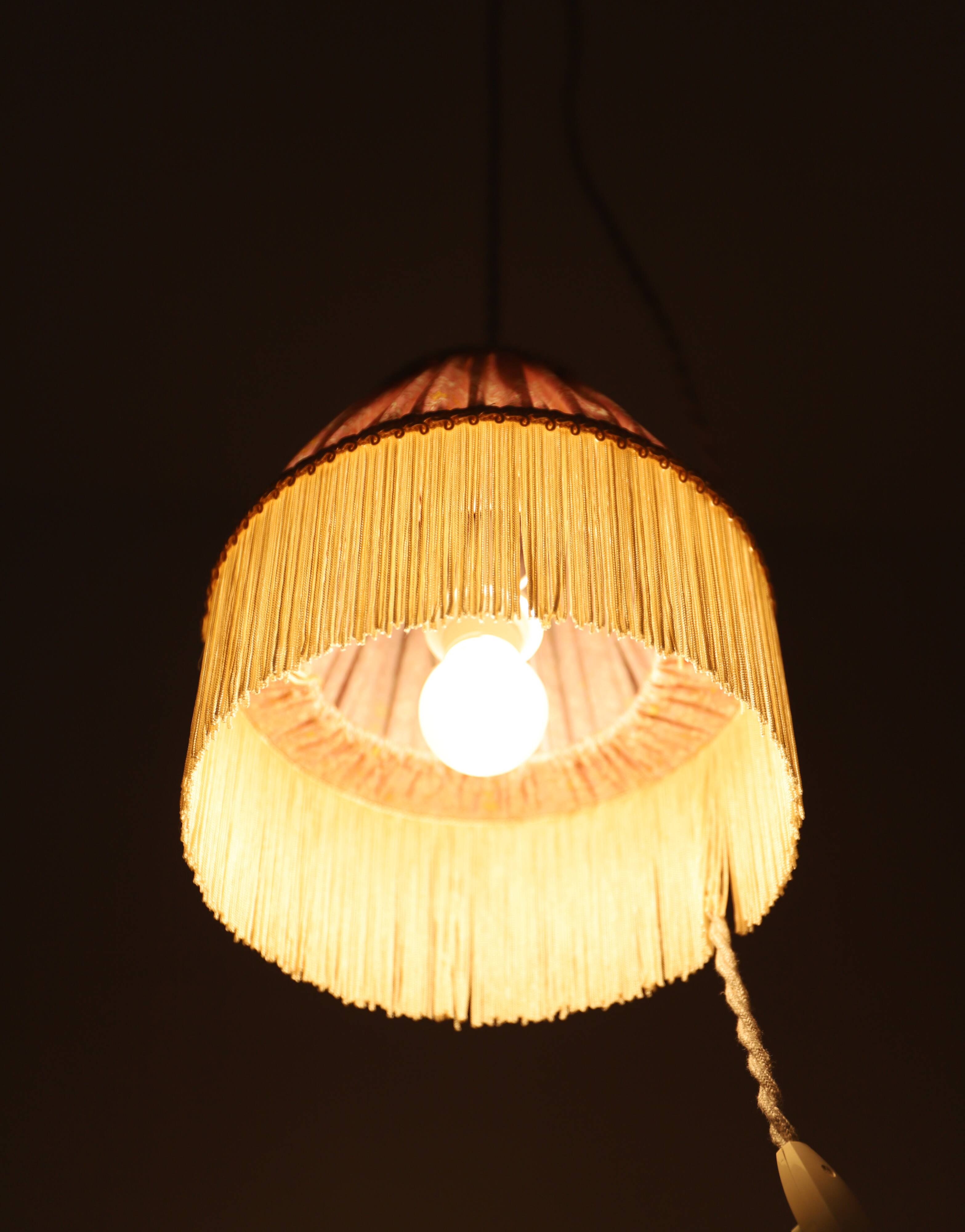 Small floral portable lamp with fringed finish