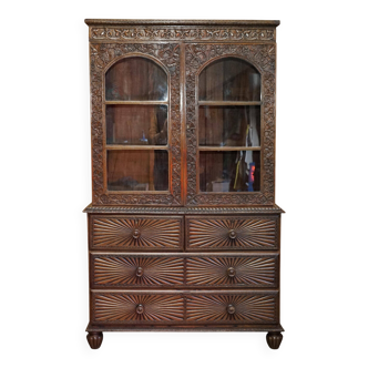 19th-century Anglo-Indian colonial hardwood library on a chest of drawers.
