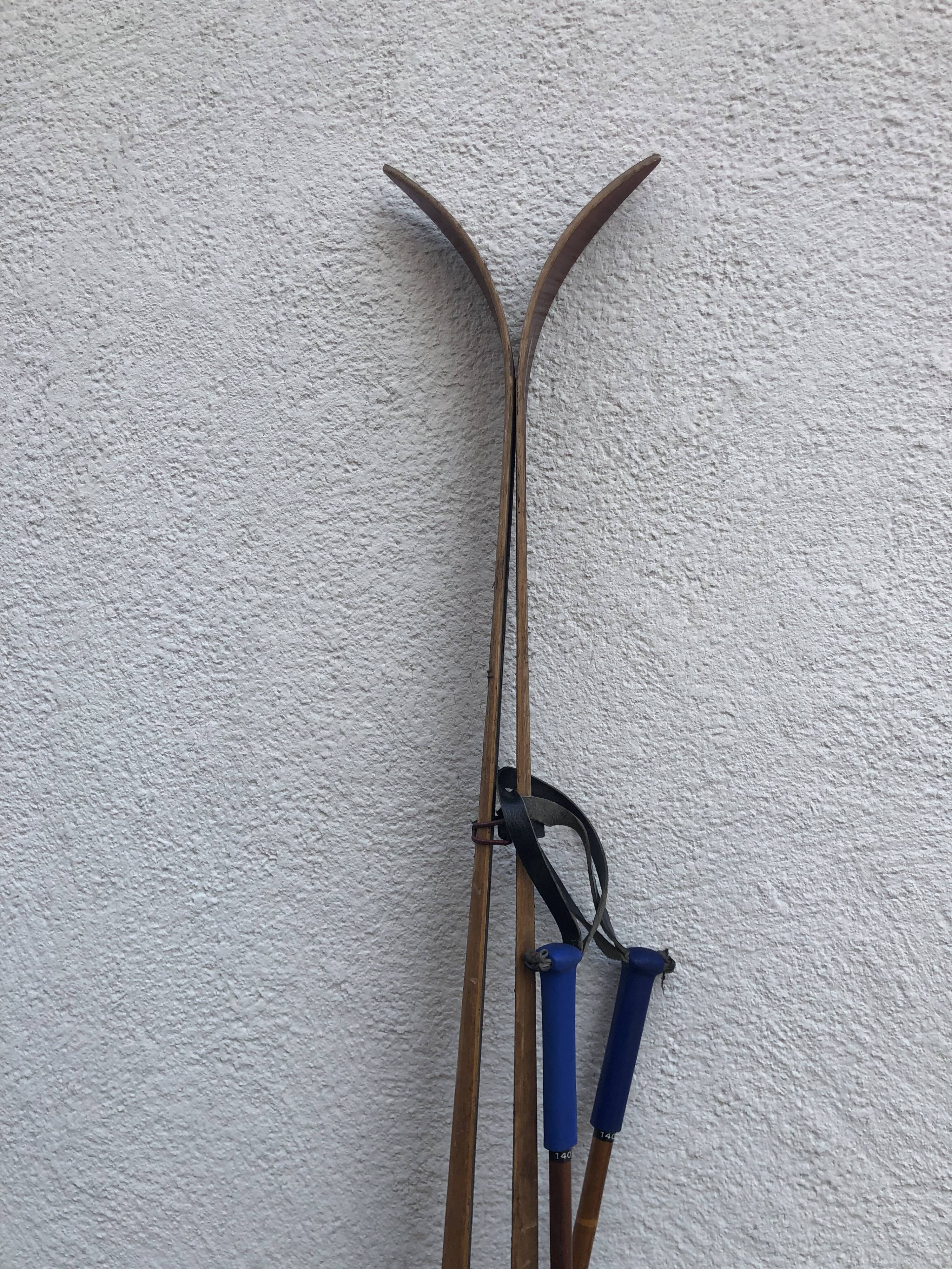 Vintage skis with poles