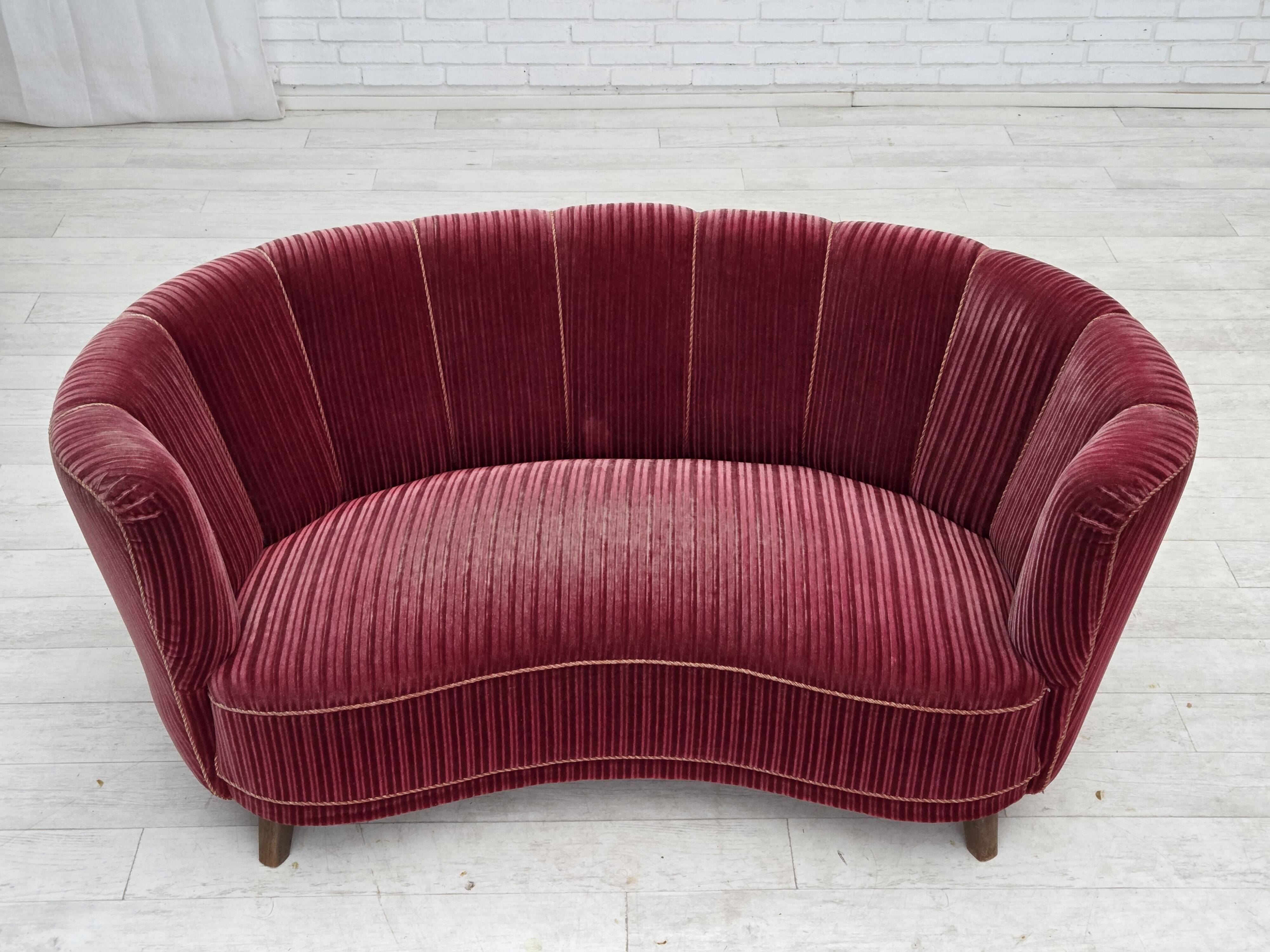 1960s, Danish 2-seater "Banana" sofa, red furniture velour, oak wood.