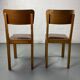 Pair of wooden and leather chairs