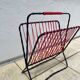 Scoubidou and wrought iron magazine rack