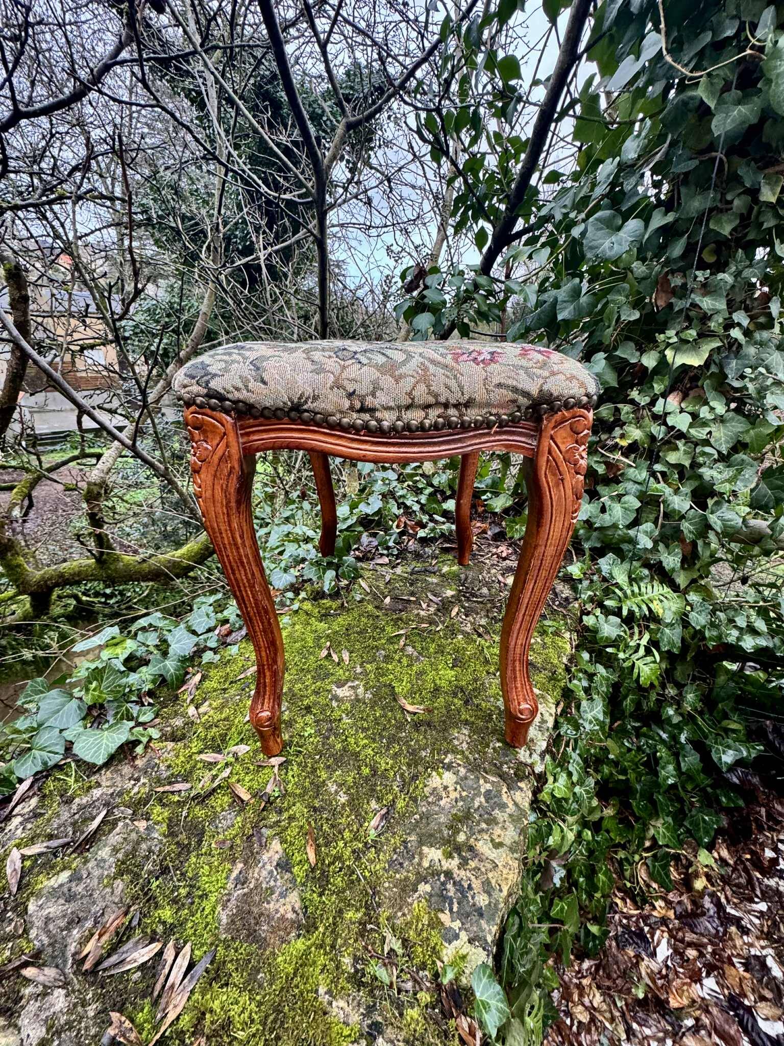 Large antique footrest in the Louis XV style.