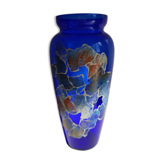 Blue colored glass vase with painted abstract patterns