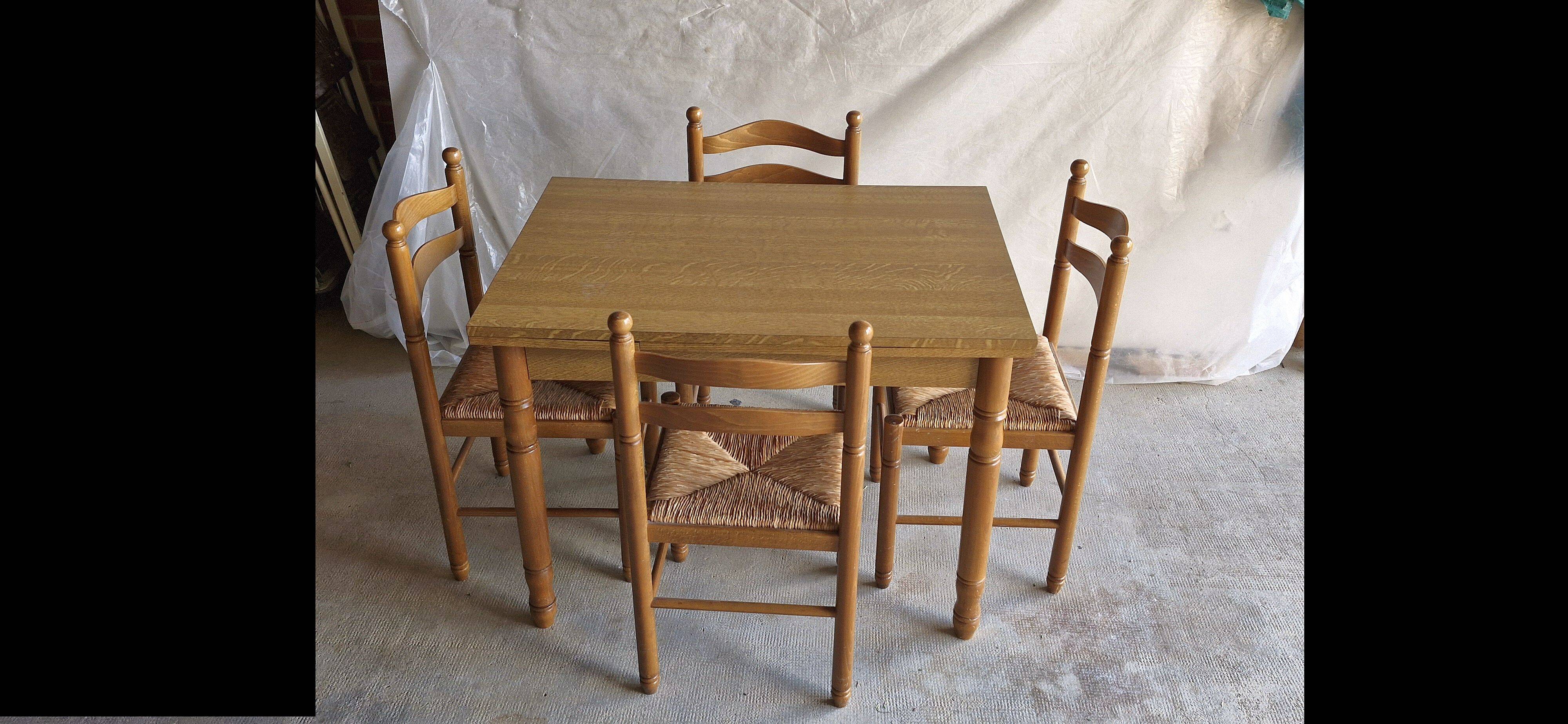 Wooden table with 2 extensions + 4 wooden chairs with rush seats