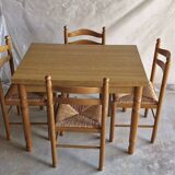 Wooden table with 2 extensions + 4 wooden chairs with rush seats