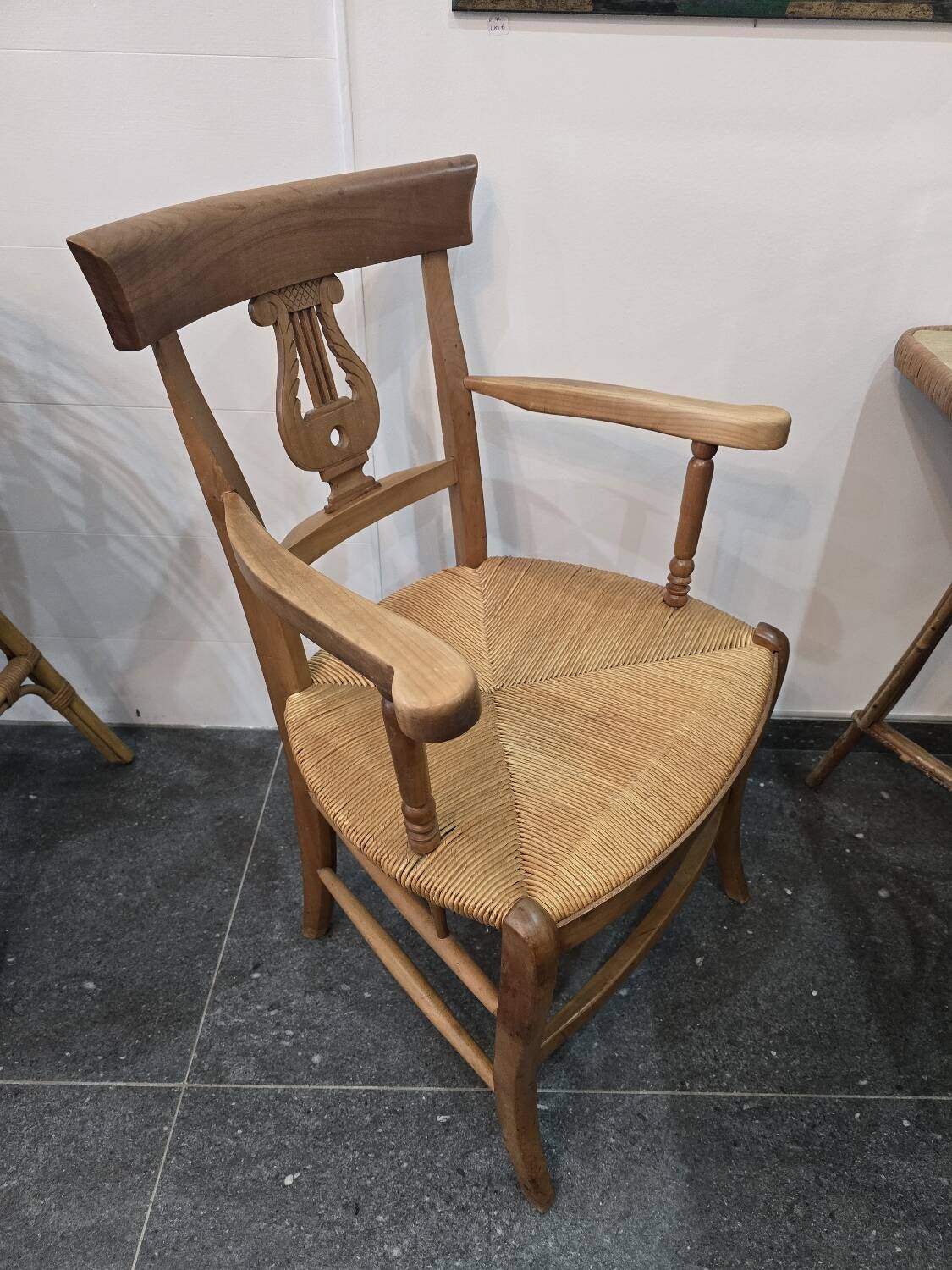 Pair of antique lyre-shaped armchairs – woven straw seats