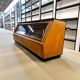 Vintage wooden shop counter with display case