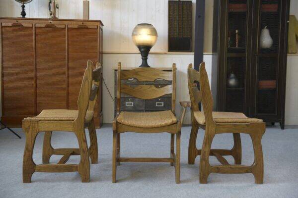 Set of 6 oak dining chairs with rush seat and 'Echelle' backrest in the style of Guillerme et Chambron 1950s