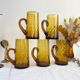 Set of 5 vintage beer glasses in amber twisted glass