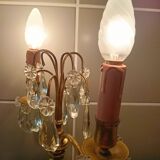 Pair of bronze girandoles with crystal pendants, two arms of lights.