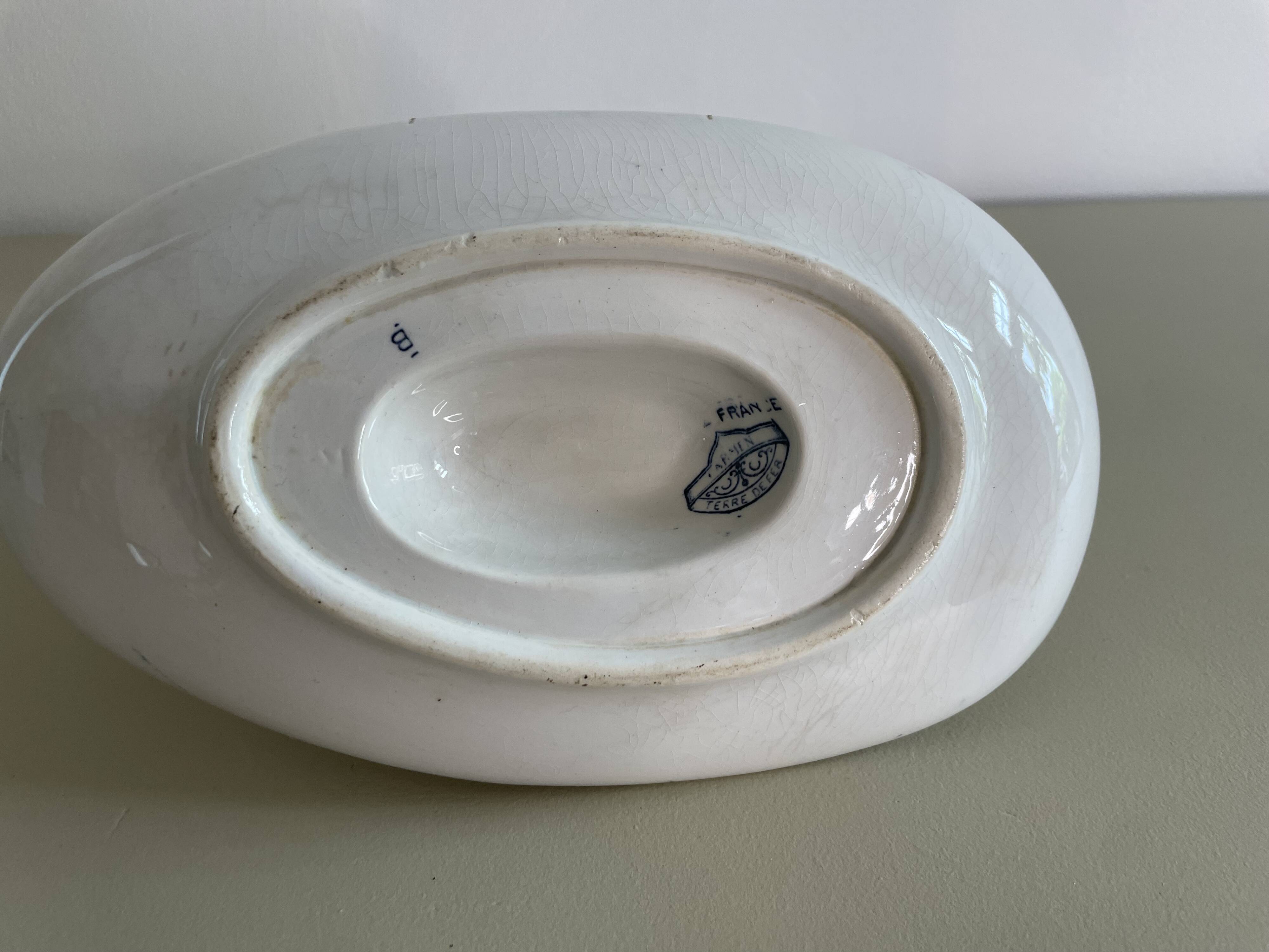 Sauce boat in blue iron earth Sarreguemines model Carmen