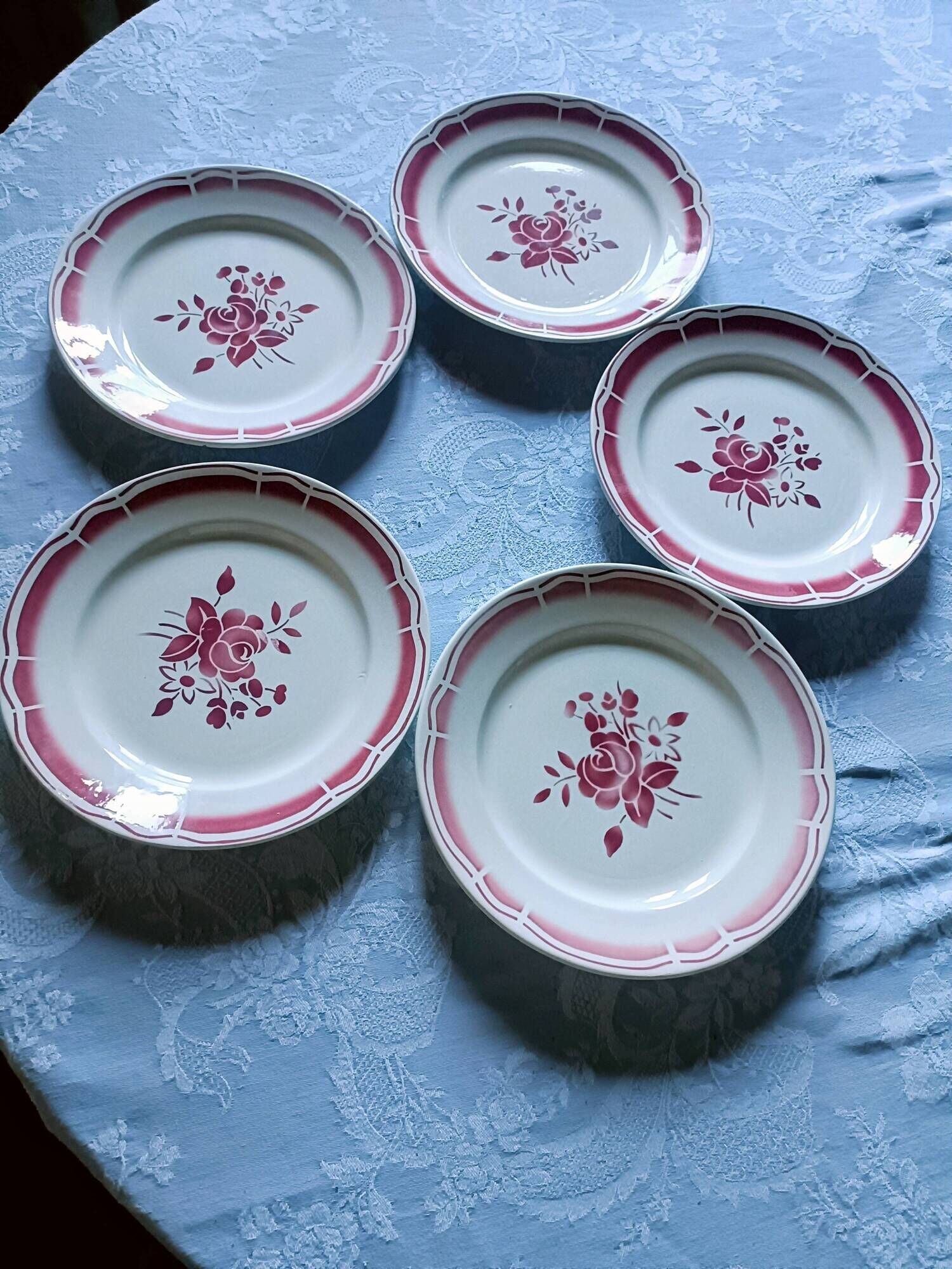 Five numbered opaque porcelain plates from Badonviller.