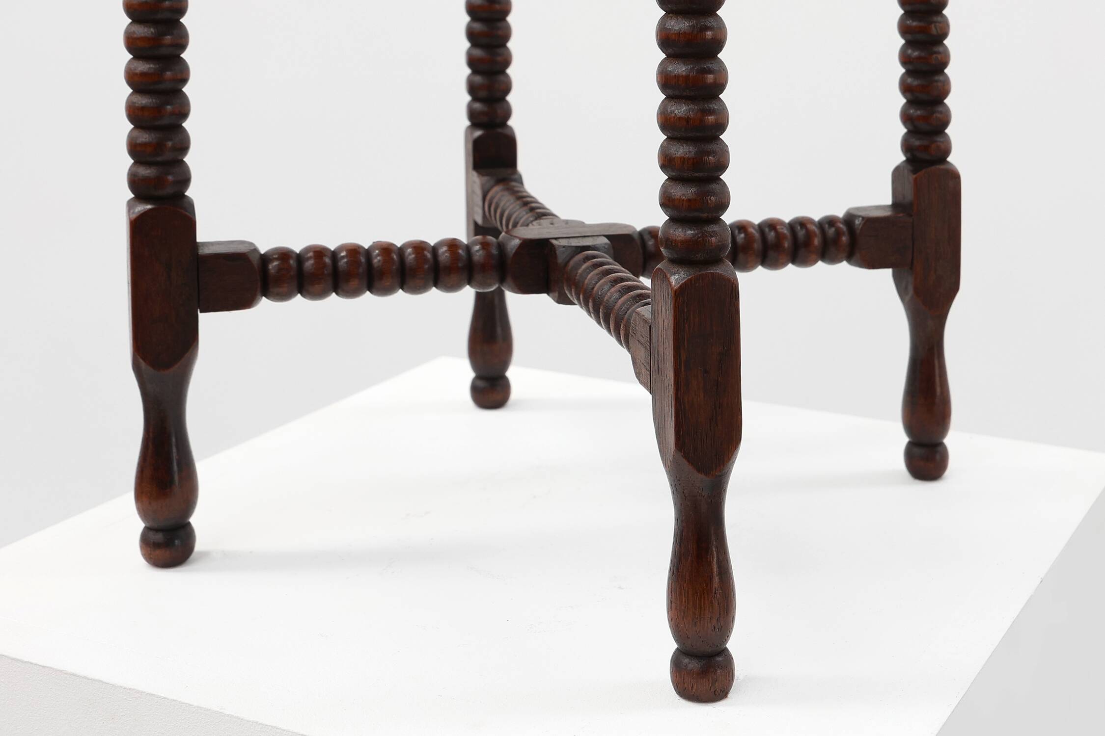 Art Deco round wooden side table with spindle legs, France circa 1900