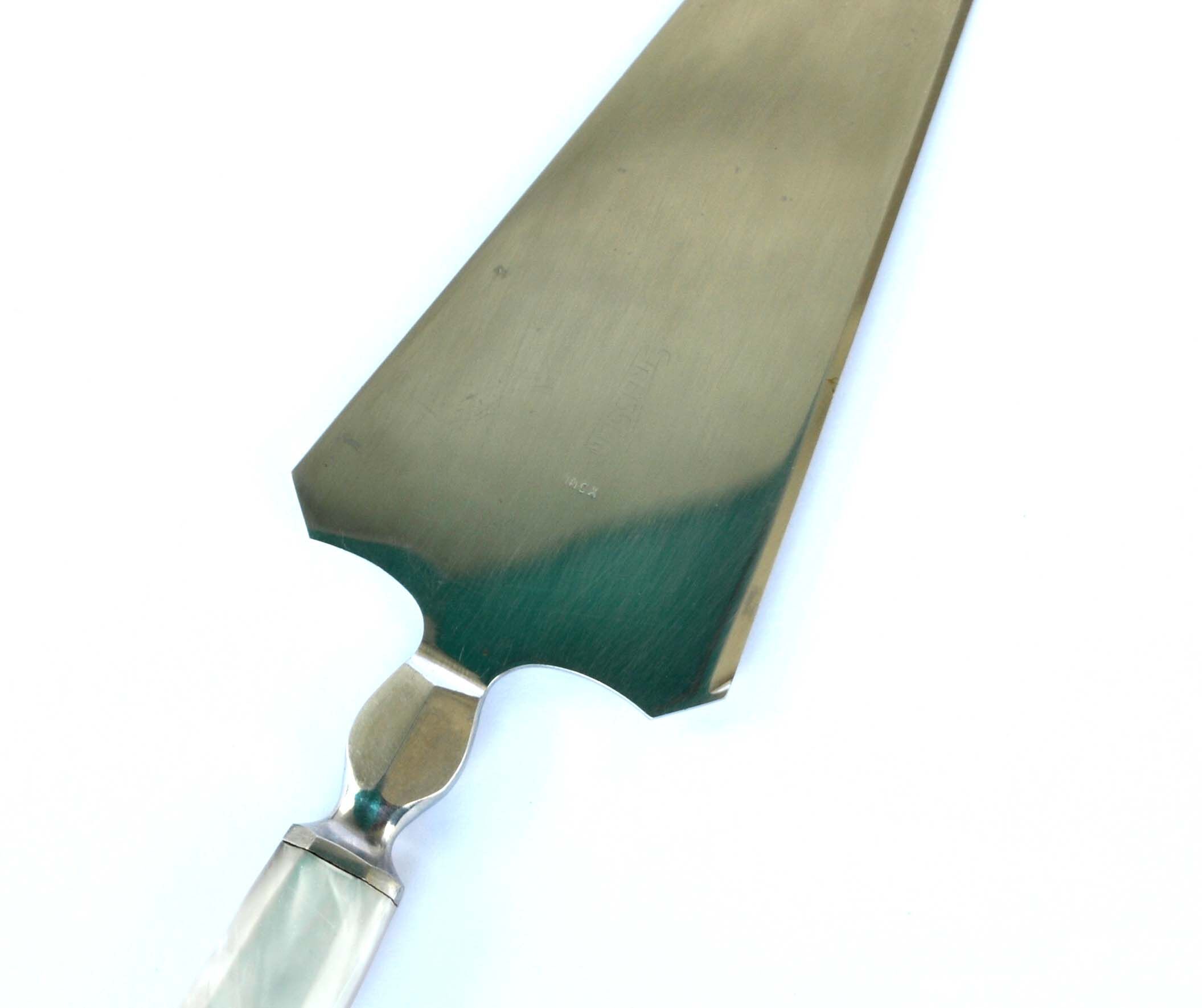 Vintage pie shovel by Streisguth in stainless steel and pearly resin handle