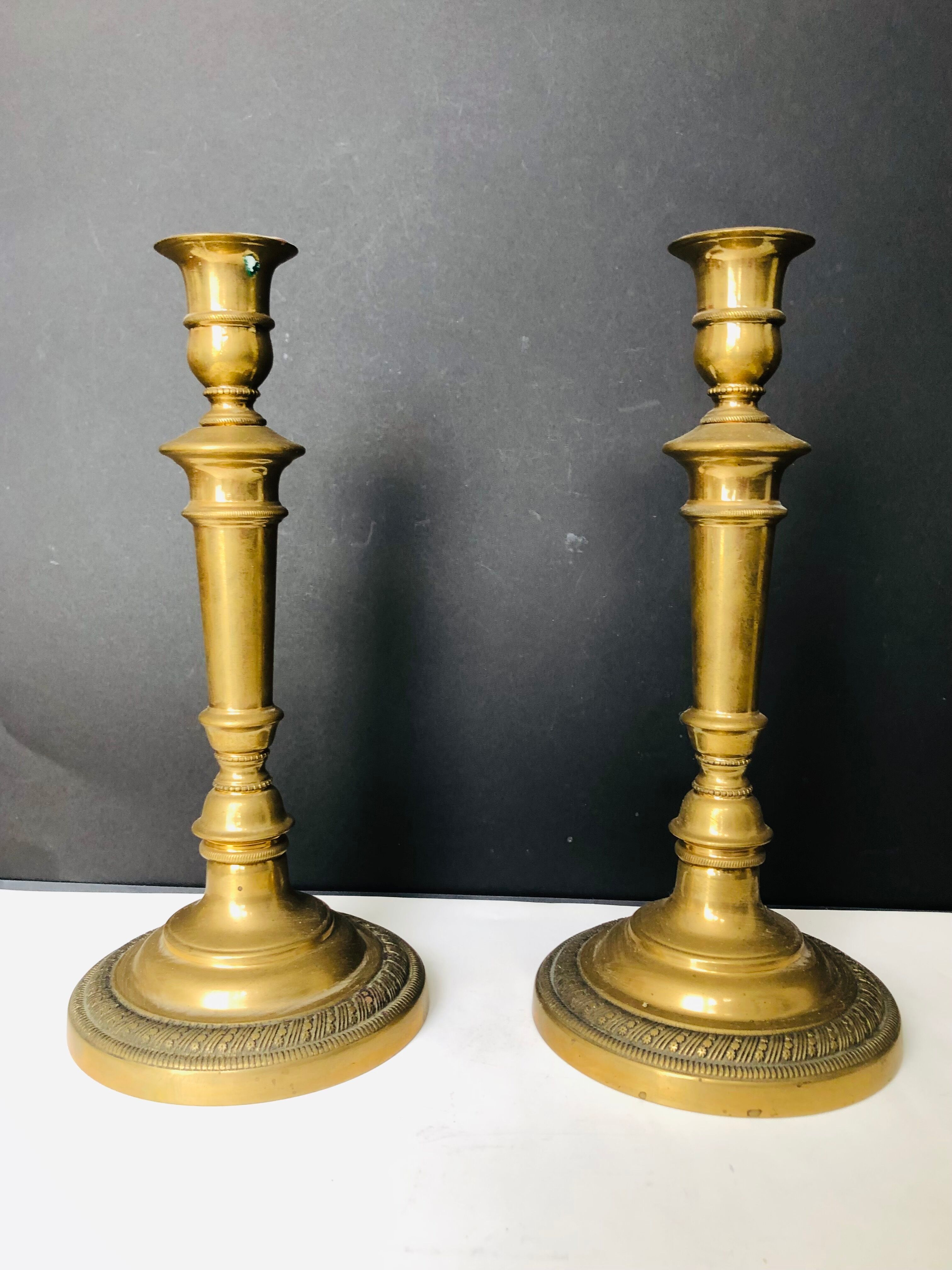 Pair of torches or candle holders in bronze