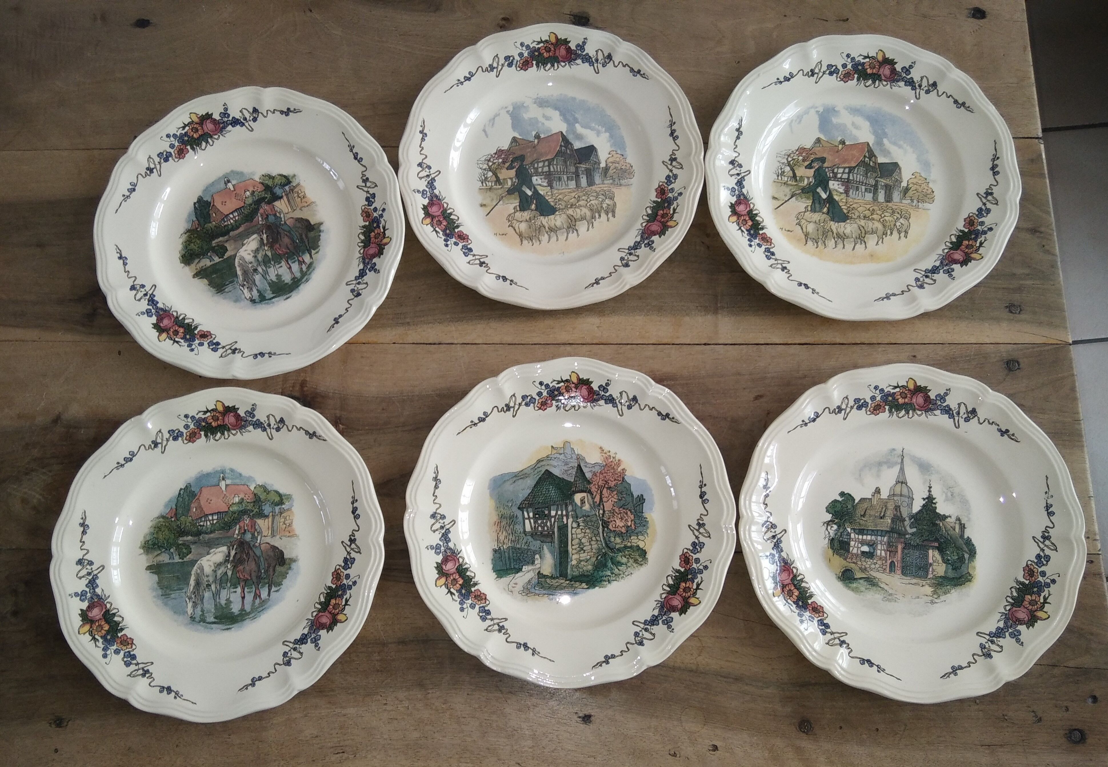 6 plates of the obernai decoration service by Henri Loux