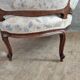 Small sofa or bench in Louis XV style, rococo.