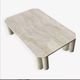 Antona travertine coffee table by the Italian publisher Up&Up.